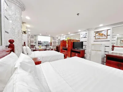 Chambre familiale avec vue sur le jardin — K&T Hotel - Center SaiGon